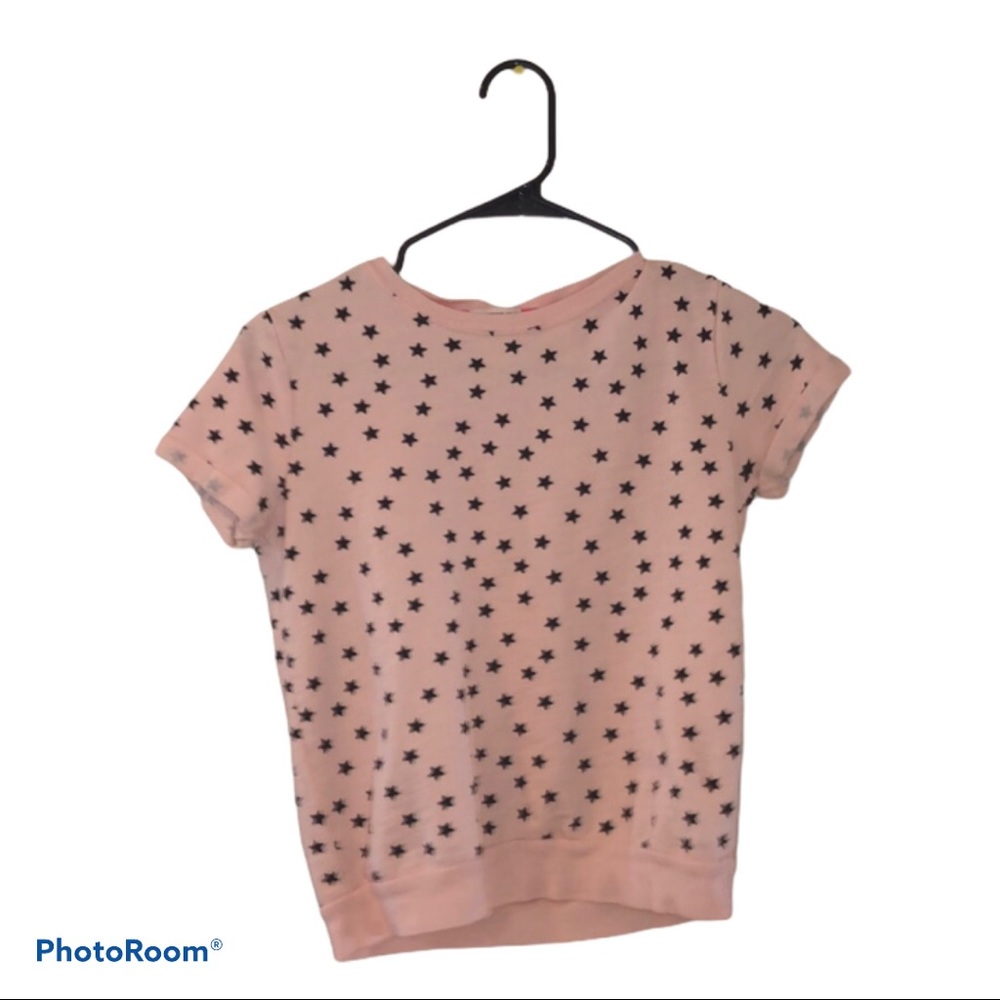 Blush pink shirt with black stars